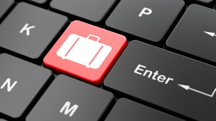keyboard with a suitcase image on a key
