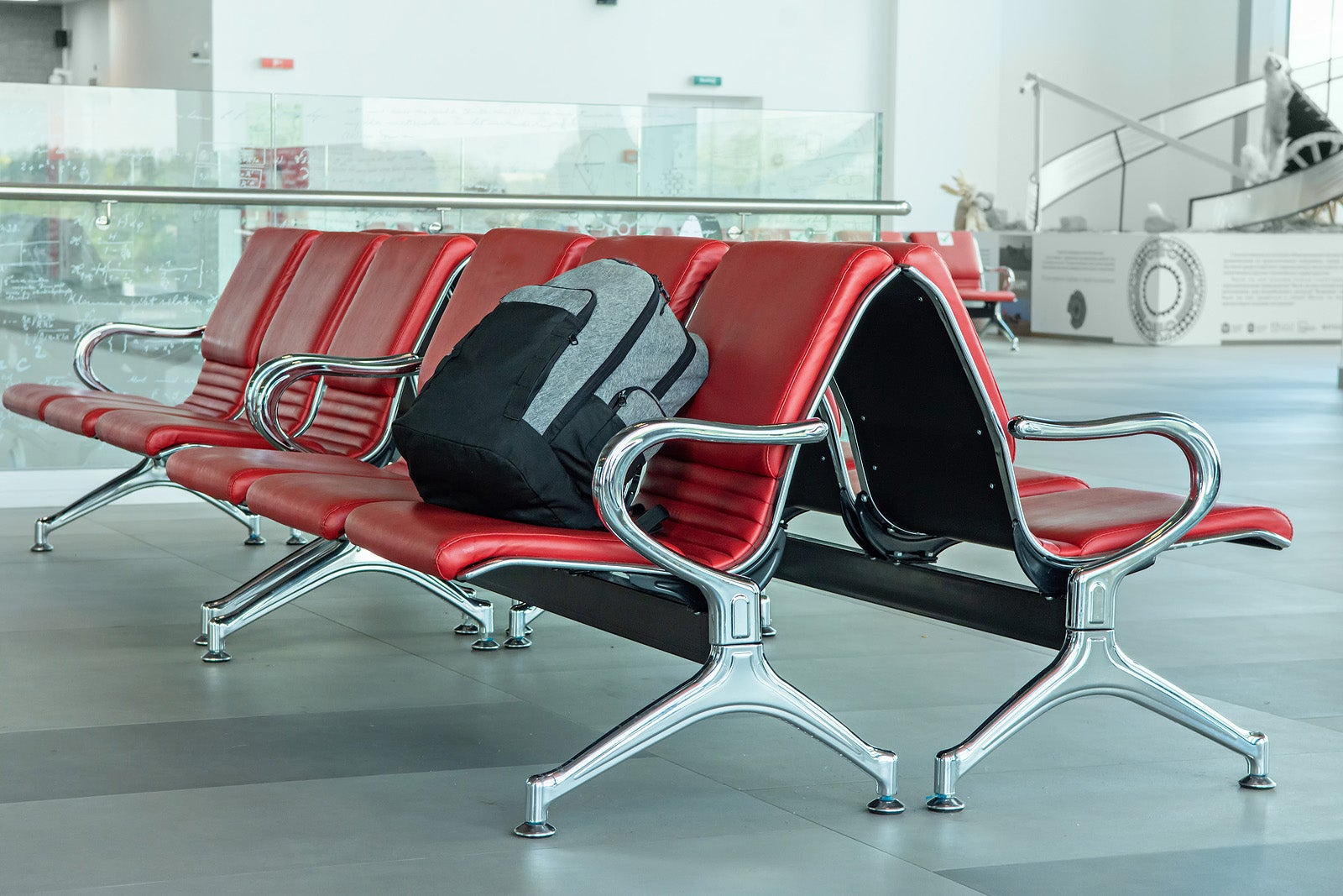 backpack in airport chairs