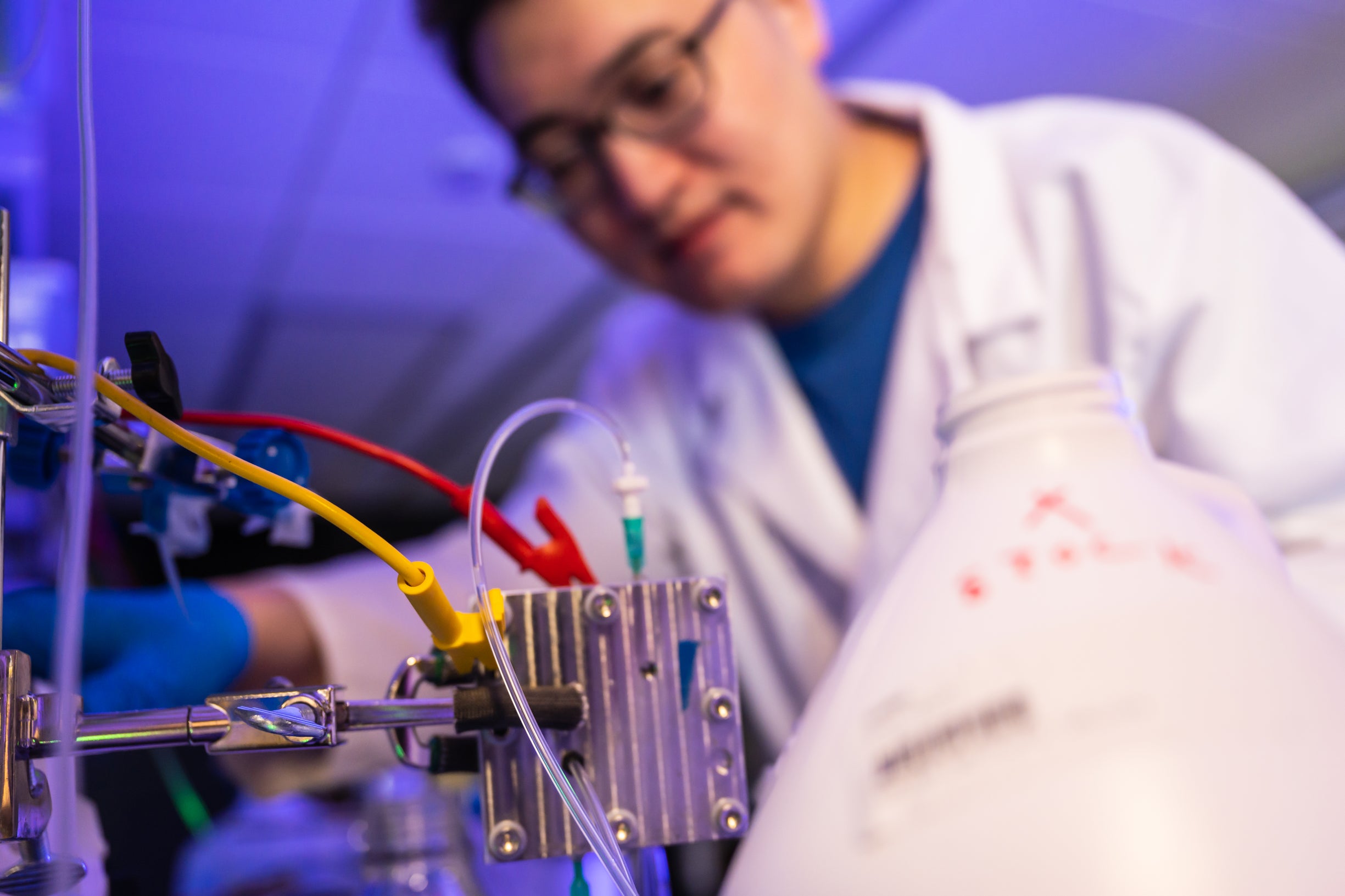 Graduate student working on his lab project